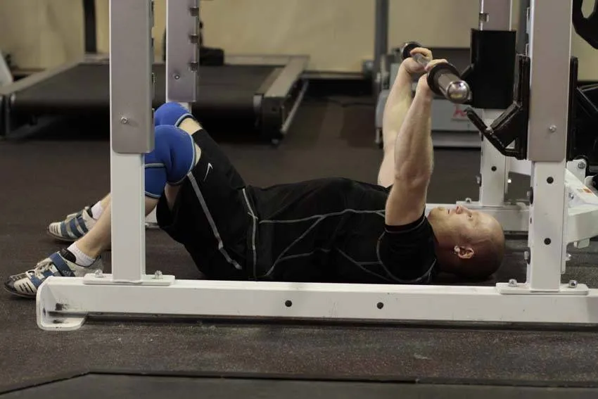 Barbell floor press: start and finish positions