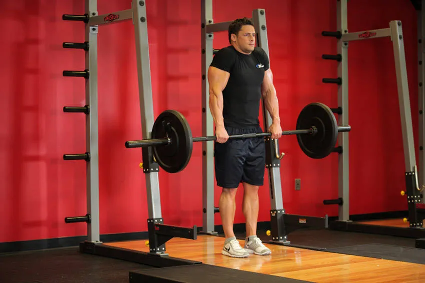 Barbell shrug: start and finish positions