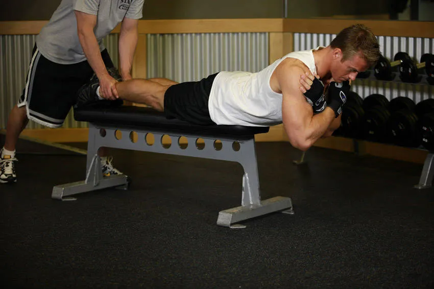 Bench hyperextension: start and finish positions