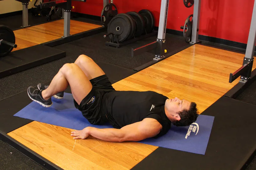 Bent-knee hip raise: start and finish positions