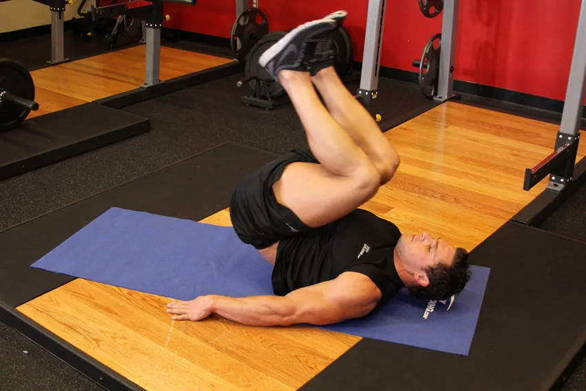 Bent-knee hip raise: start and finish positions