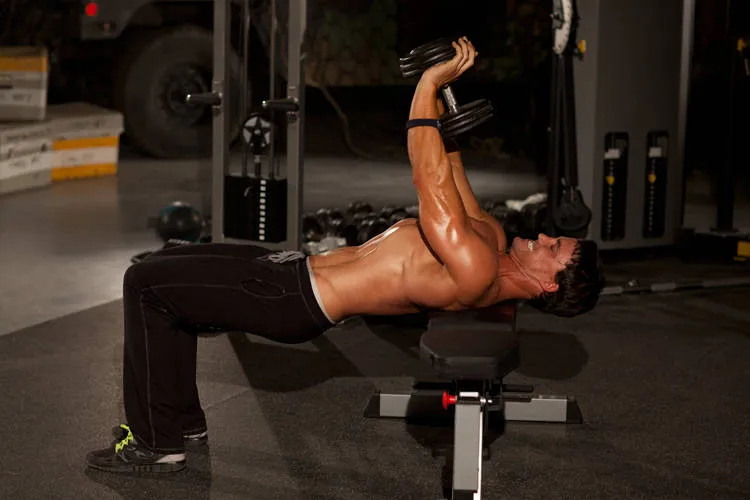 Close-grip dumbbell press: start and finish positions
