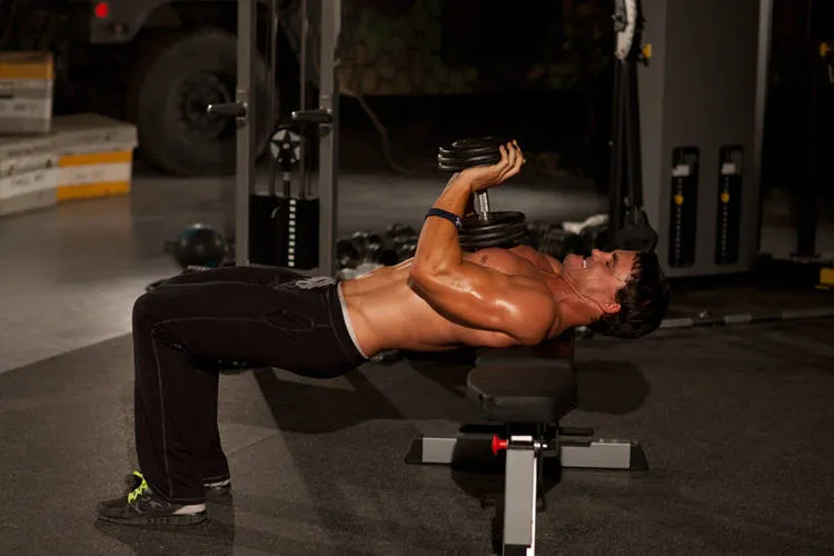 Close-grip dumbbell press: start and finish positions