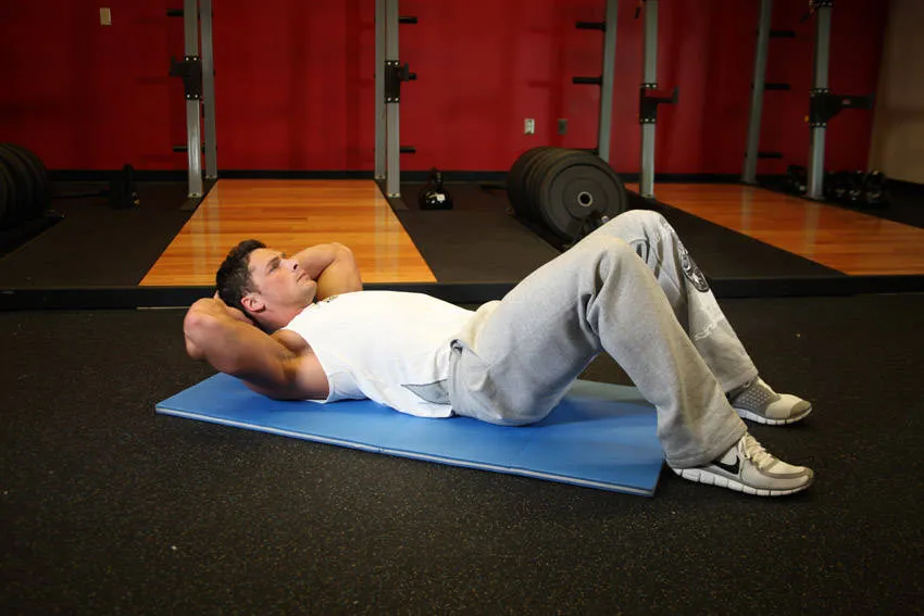 Cross-body crunch: start and finish positions