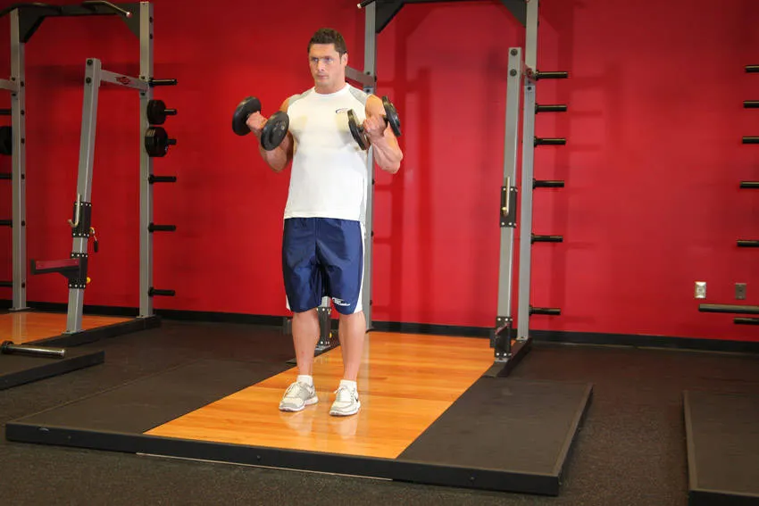 Dumbbell curl: start and finish positions
