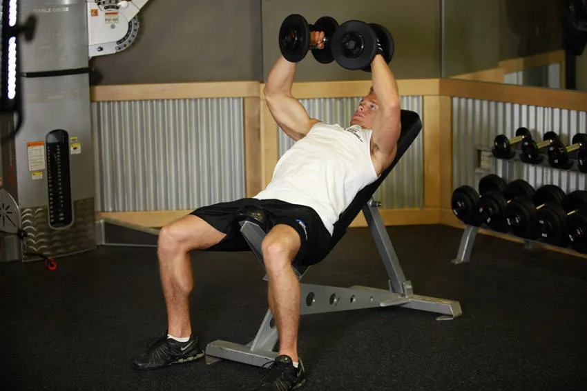 Incline dumbbell fly: start and finish positions