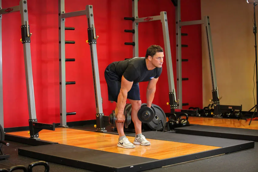 Dumbbell hip hinge: start and finish positions