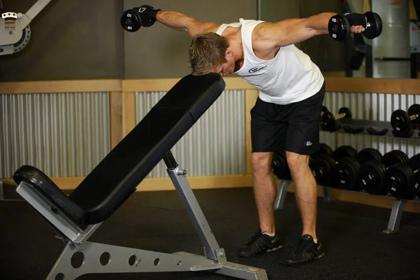 Dumbbell rear fly: start and finish positions