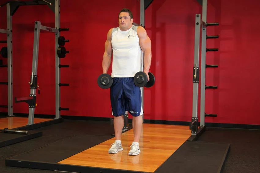 Dumbbell shrug: start and finish positions