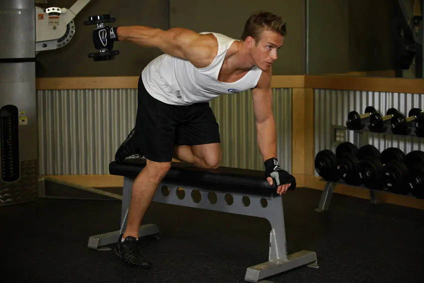 Dumbbell tricep kickback: start and finish positions