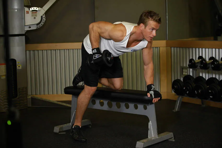 Dumbbell tricep kickback: start and finish positions