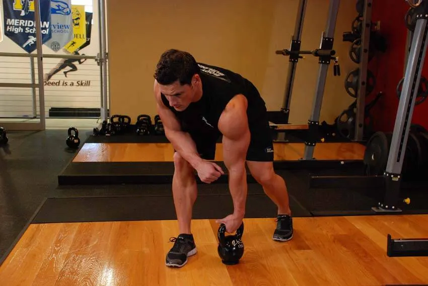 Kettlebell row: start and finish positions