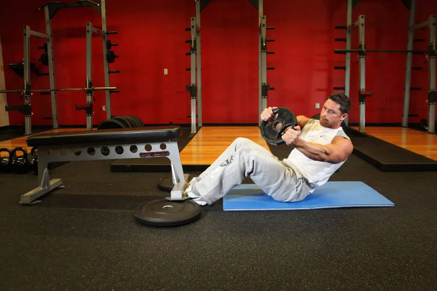Kettlebell Russian twist: start and finish positions