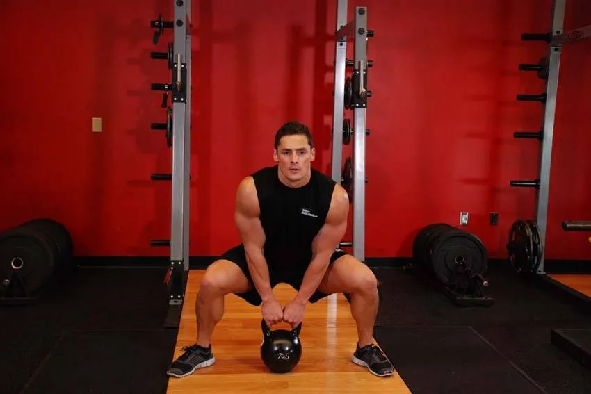Kettlebell sumo high pull: start and finish positions