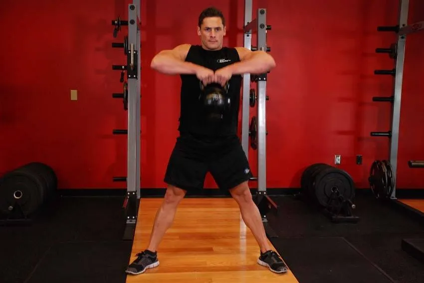 Kettlebell sumo high pull: start and finish positions