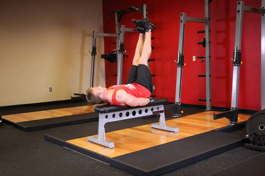 Lying leg raise: start and finish positions