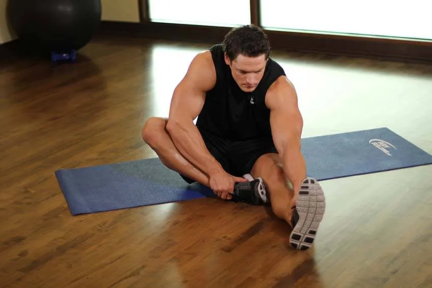 One-leg seated forward fold: start and finish positions