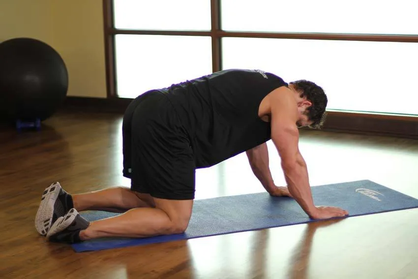 All-fours quad stretch: start and finish positions