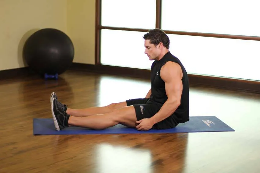 Seated forward fold: start and finish positions