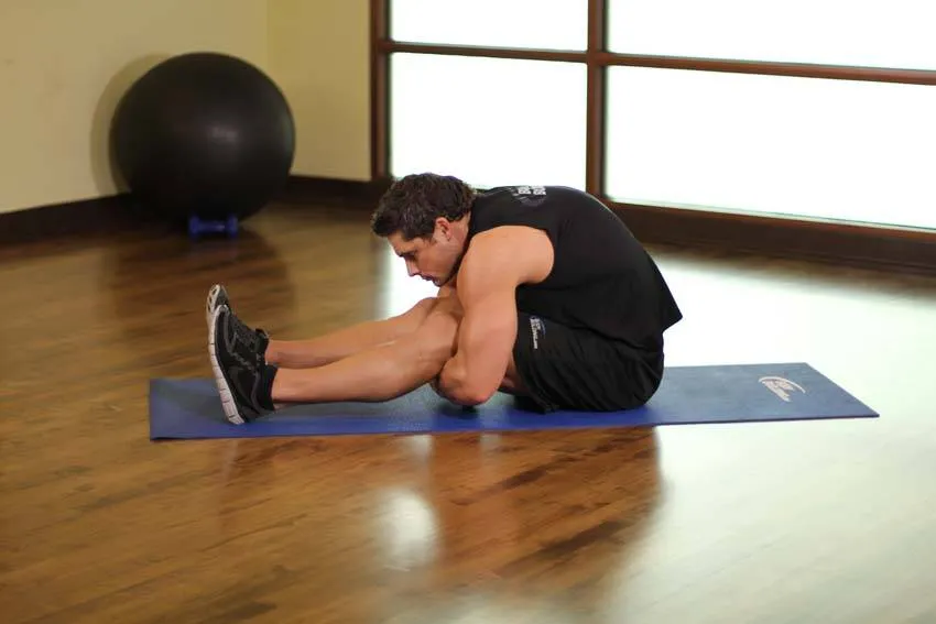 Seated forward fold: start and finish positions