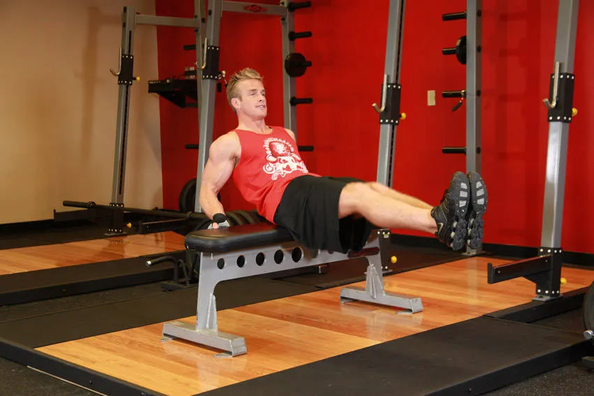 Seated leg tucks: start and finish positions