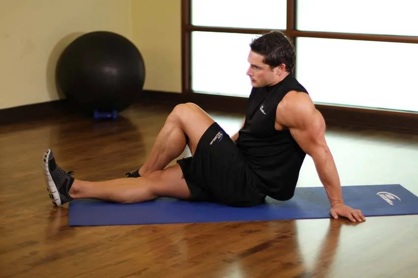 Seated spinal twist: start and finish positions