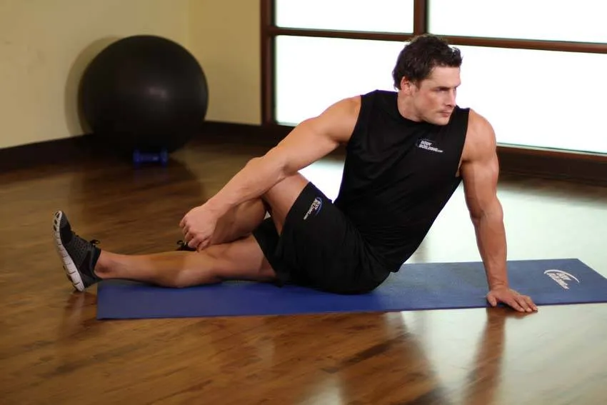 Seated spinal twist: start and finish positions