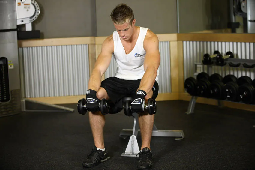 Seated wrist curl: start and finish positions