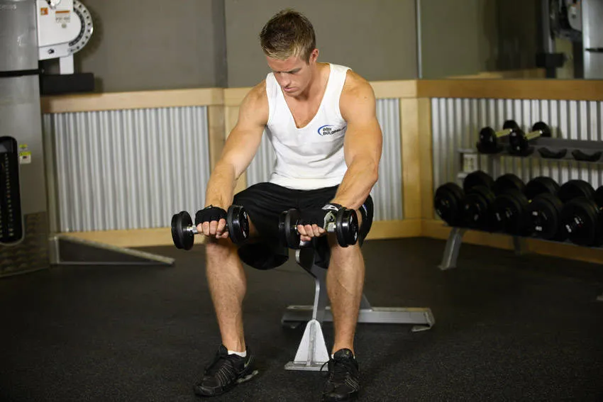 Seated wrist curl: start and finish positions